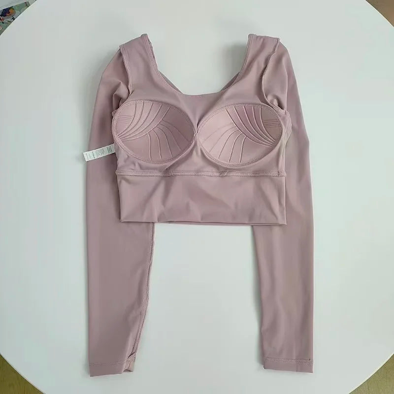 Ava top fitness  manches longues pour femmes, avec bretelles croisées.